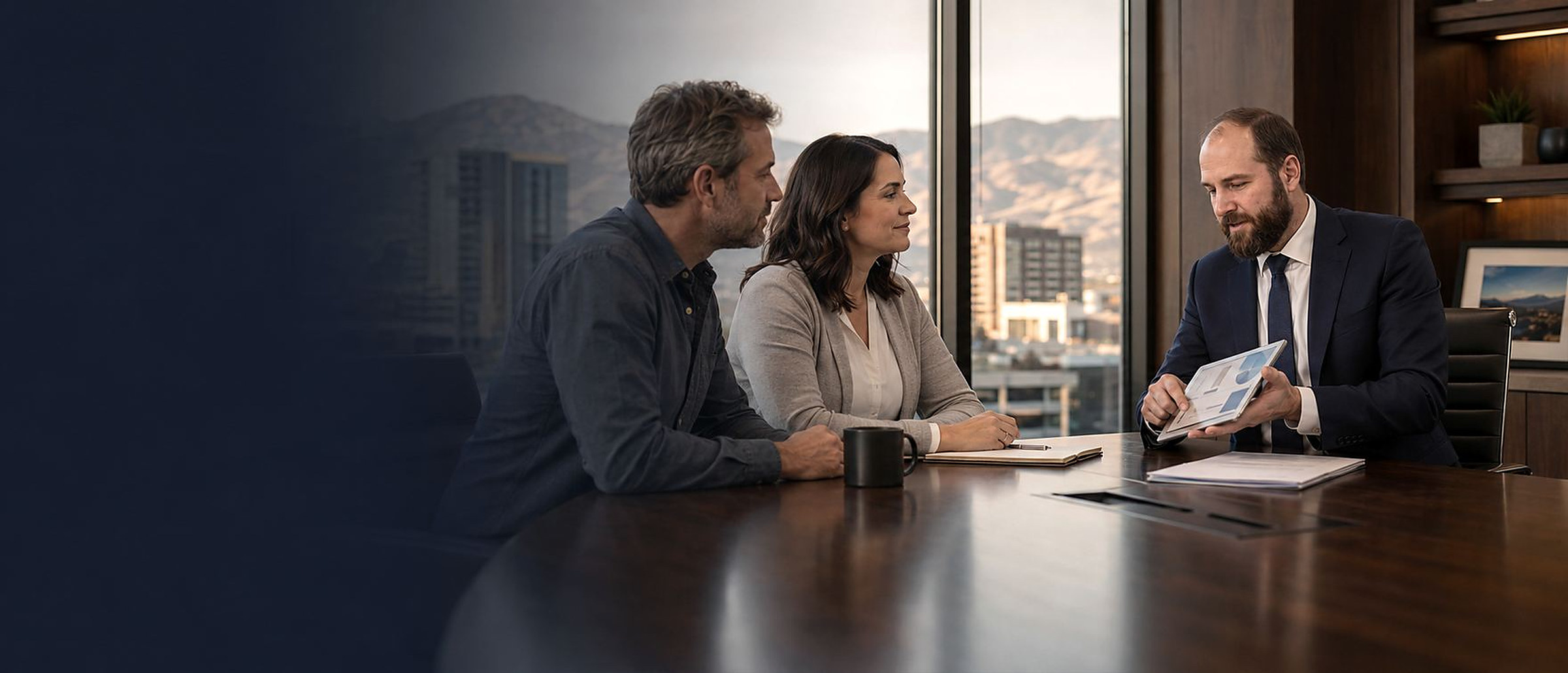 Reno business attorney meeting with business owners in a downtown Reno office